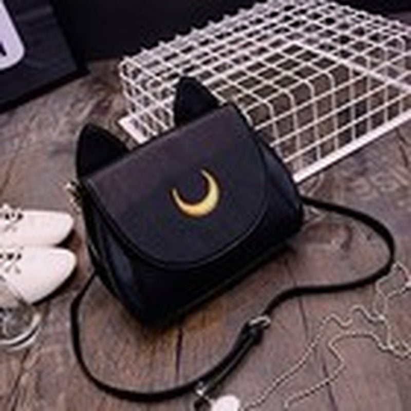 Cosmic Cat-venture Bags: Purr-sian Moonlight Purse for Your Inner Gothic Sailor Sensation!